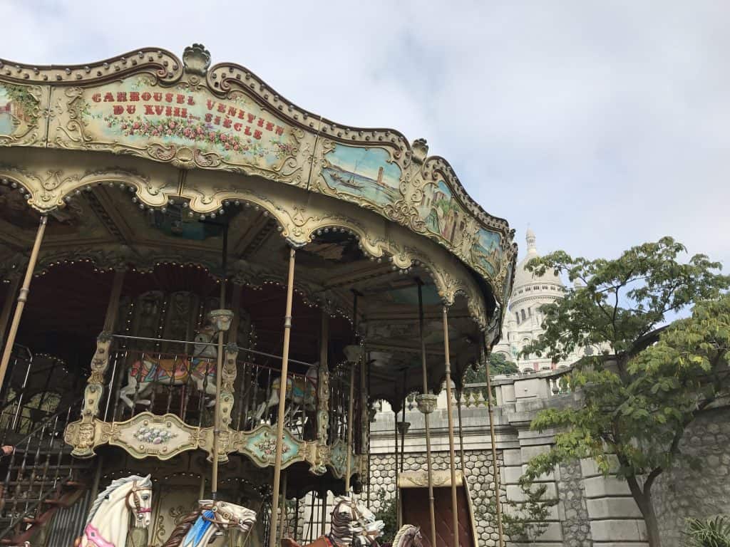 Carousel at the base of Sacre Coeur Basilica in Paris
