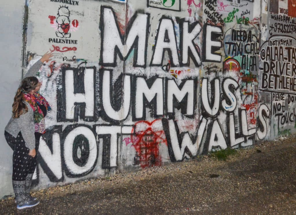 Make Hummus Not Walls street art in Bethlehem