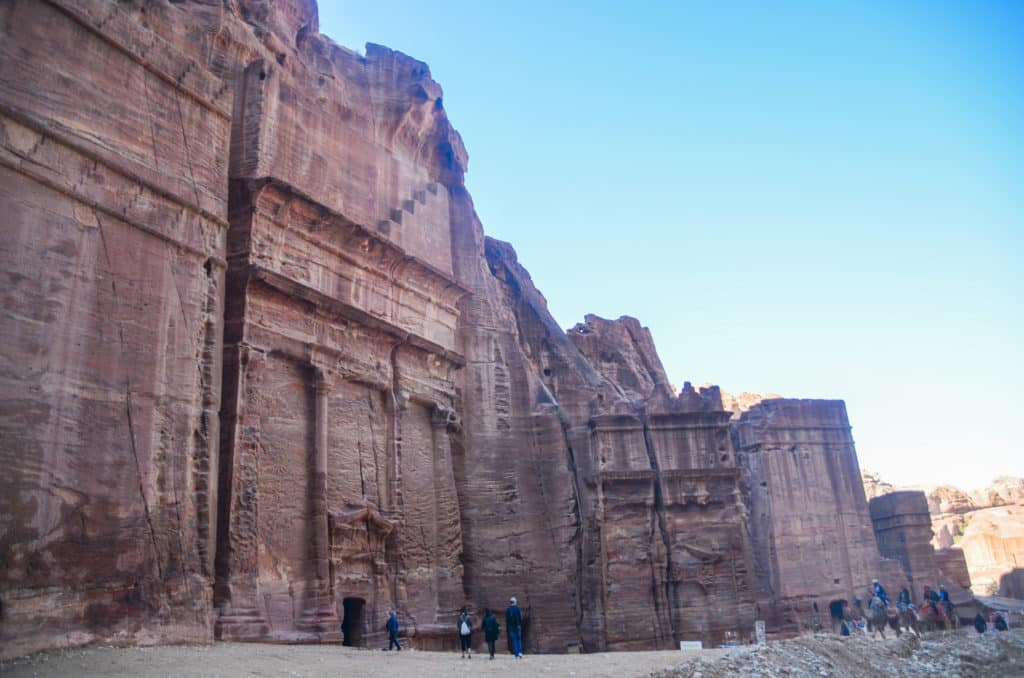 walking past the tombs in Petra