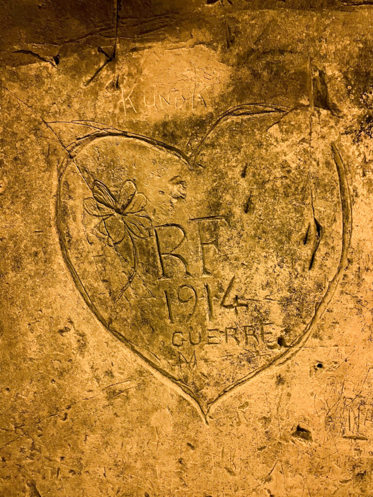 carved heart in the Wall of the cellar dating back to WWI
