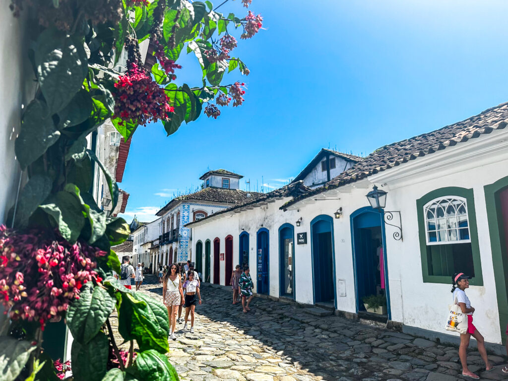 Old colonial white buildings on a cobblestone street