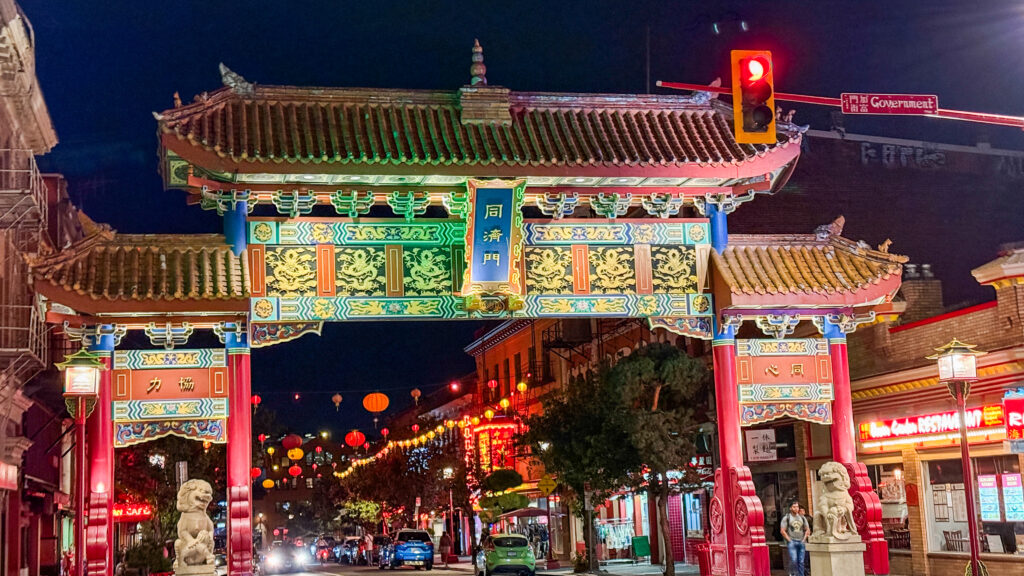 China town gate in Victoria lit up at night